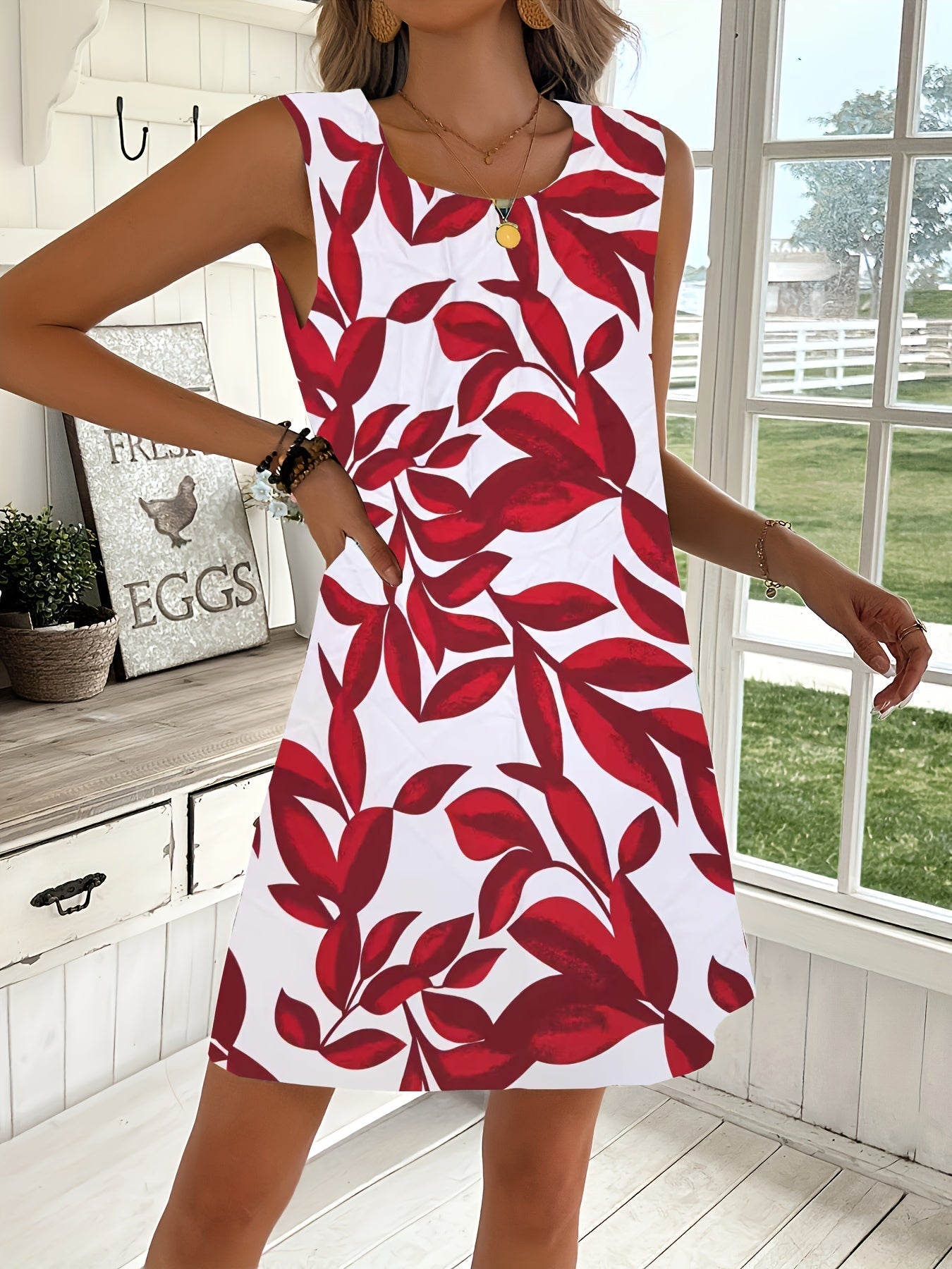 Elegantes rotes ärmelloses Sommerkleid mit Blumenmuster