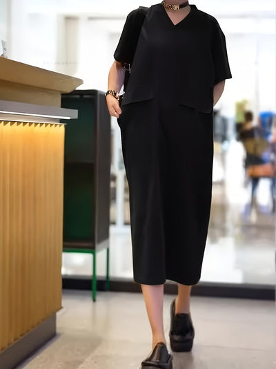 Elegantes ärmelloses Kleid mit frechem Ausschnitt und Taschen - Midi-Länge