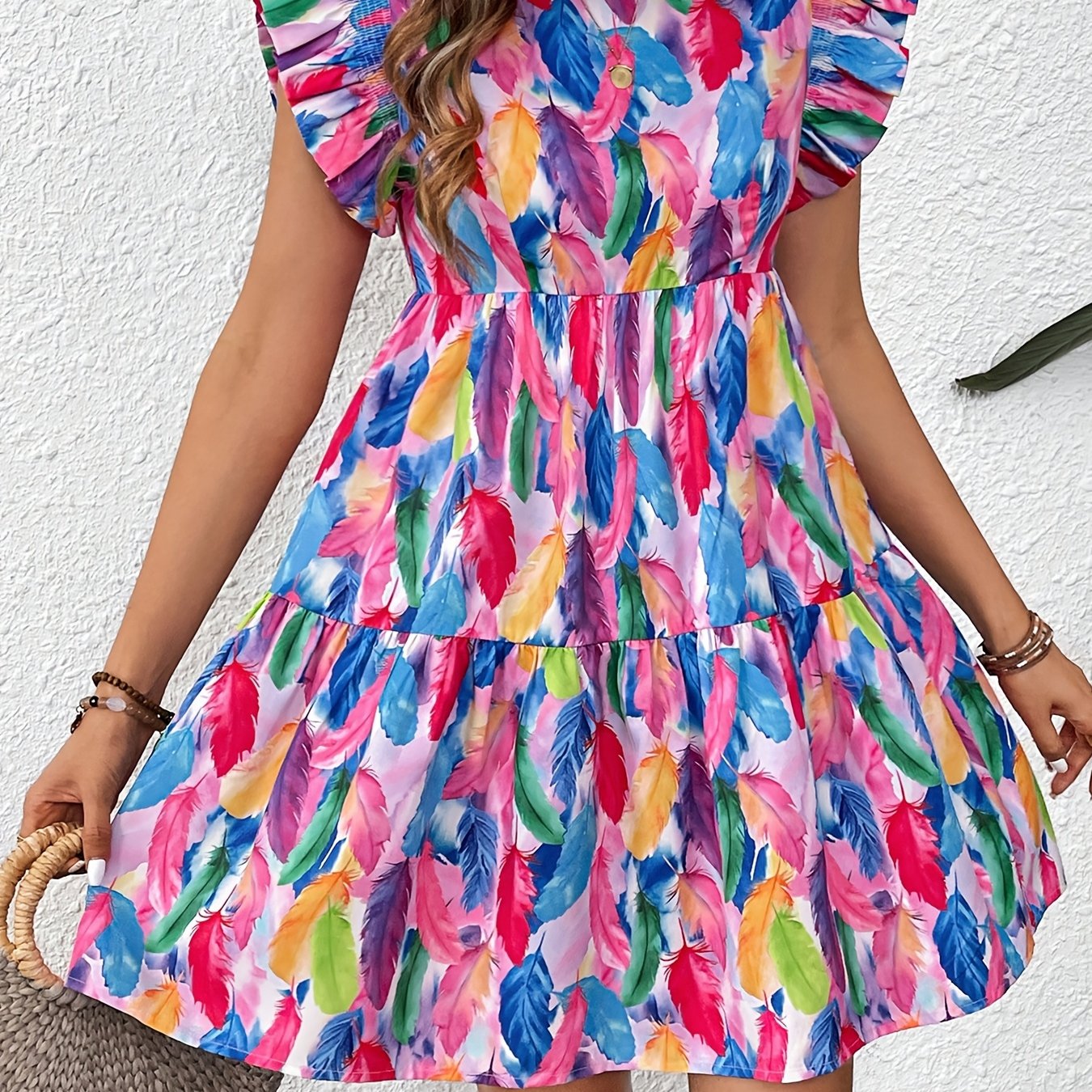 Rosa Kleid mit Volants und stufigem Rock – leichtes Design für den Sommer