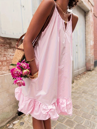 Stylisches und luftiges rosa Polyester-Sommerkleid mit dünnen Trägern