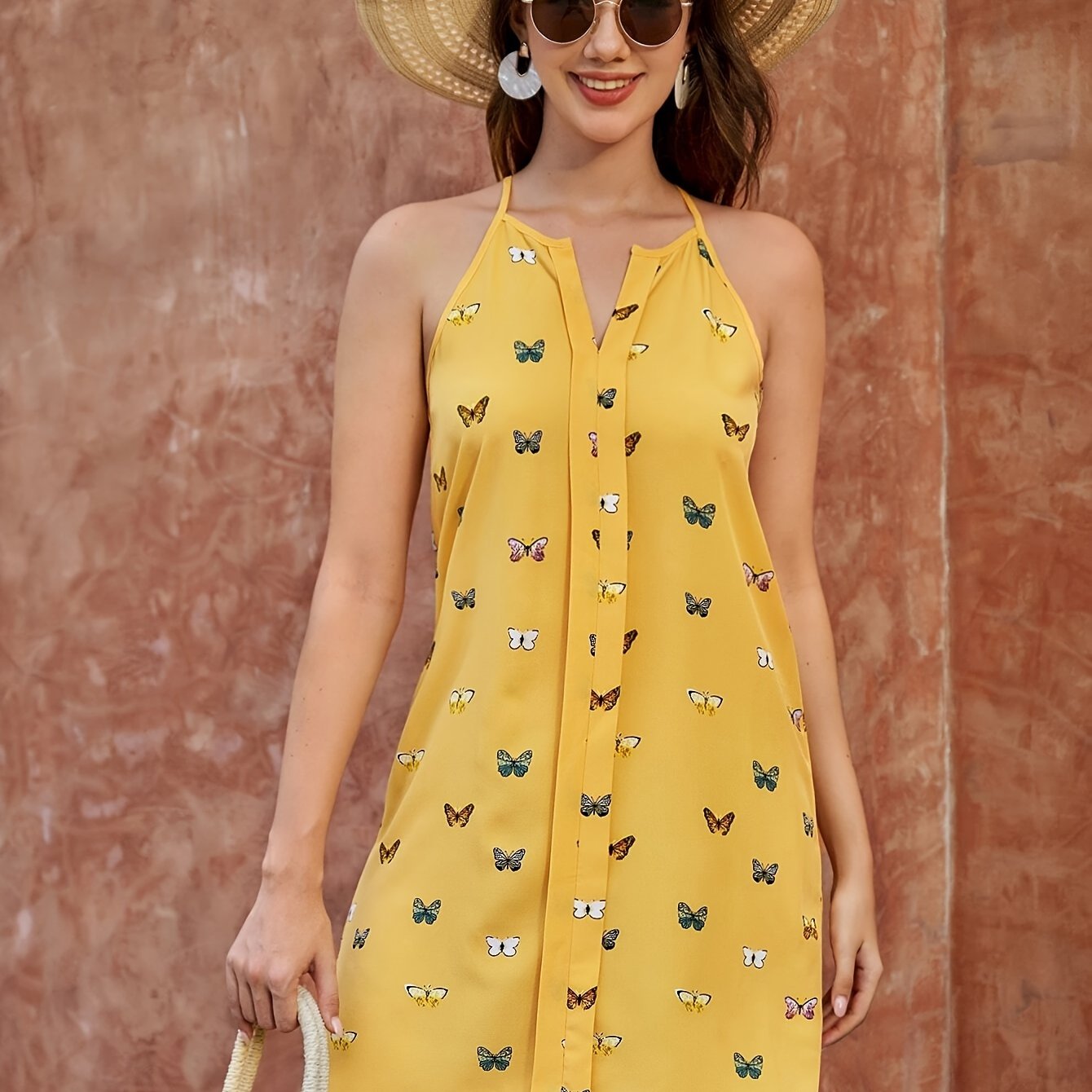 Schickes Gelbes Ärmelloses Kleid mit Schmetterlingsmotiv – Sommerliche Eleganz