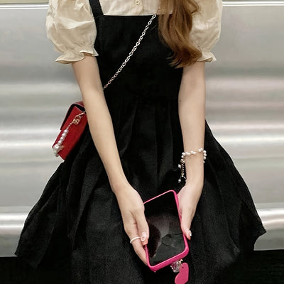 Schwarz-weißes Hemdkleid mit Puffärmeln und flachem Kragen