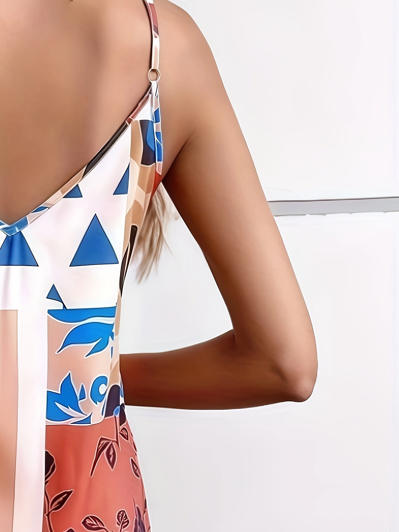 Orangefarbenes ärmelloses Boho-Kleid Spitzes Dekolleté Bunter Druck
