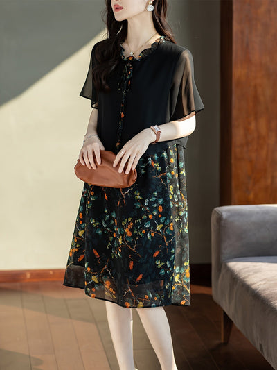 Elegantes Midikleid aus Blumen mit Spitzenkragen