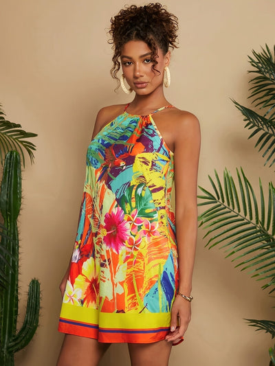 Kurzes Sommerkleid mit Halfter in tropischem Orange, mit Blumenmotiven und Papageien
