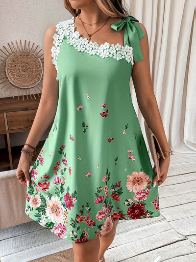 Grünes Elegantes Asymmetrisches Kleid mit Spitze und Blumenmuster – Perfekt für den Sommer