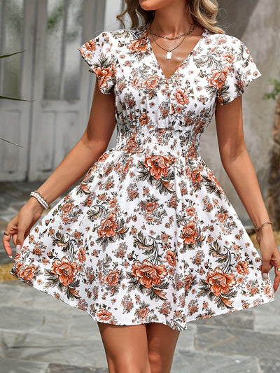 Geblümtes Kleid mit geraffter Taille – Elegante Sommermode