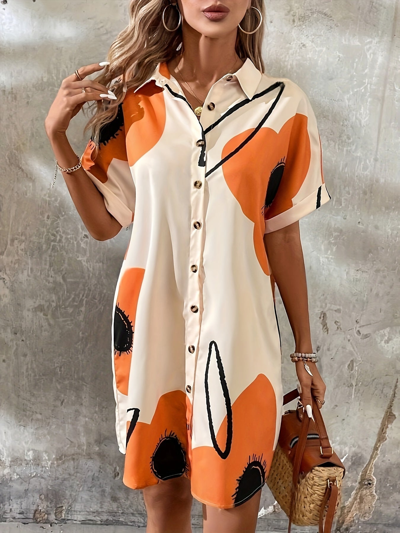 Elegantes Kleid mit kurzen Ärmeln und lockerem Schnitt