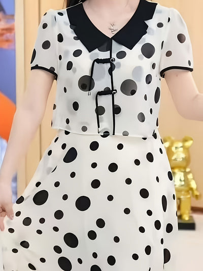 Stylisches Schwarz-Weißes Erbsenkleid - A-Linien-Schnitt, V-Ausschnitt, kurze Ärmel