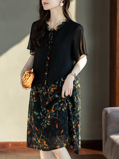 Elegantes Midikleid aus Blumen mit Spitzenkragen