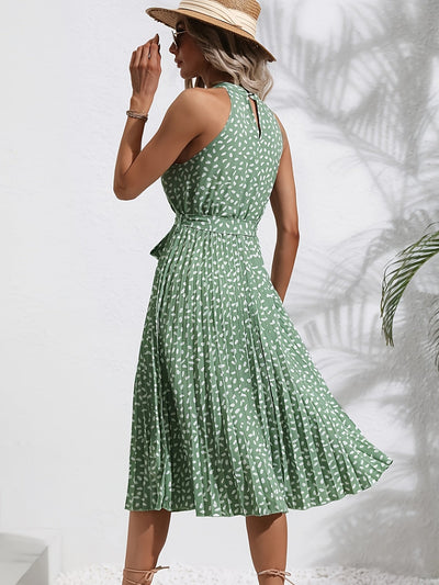 Halterkleid mit grünen Punkten, Rüschen und Taillenbindung – Perfekt für Frühling und Sommer