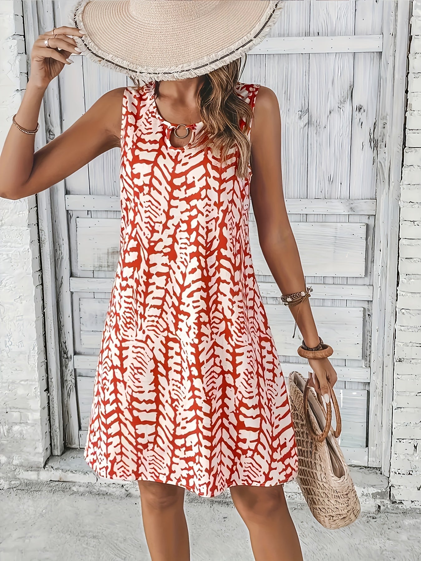 Kleid mit Tropfenausschnitt und Muster