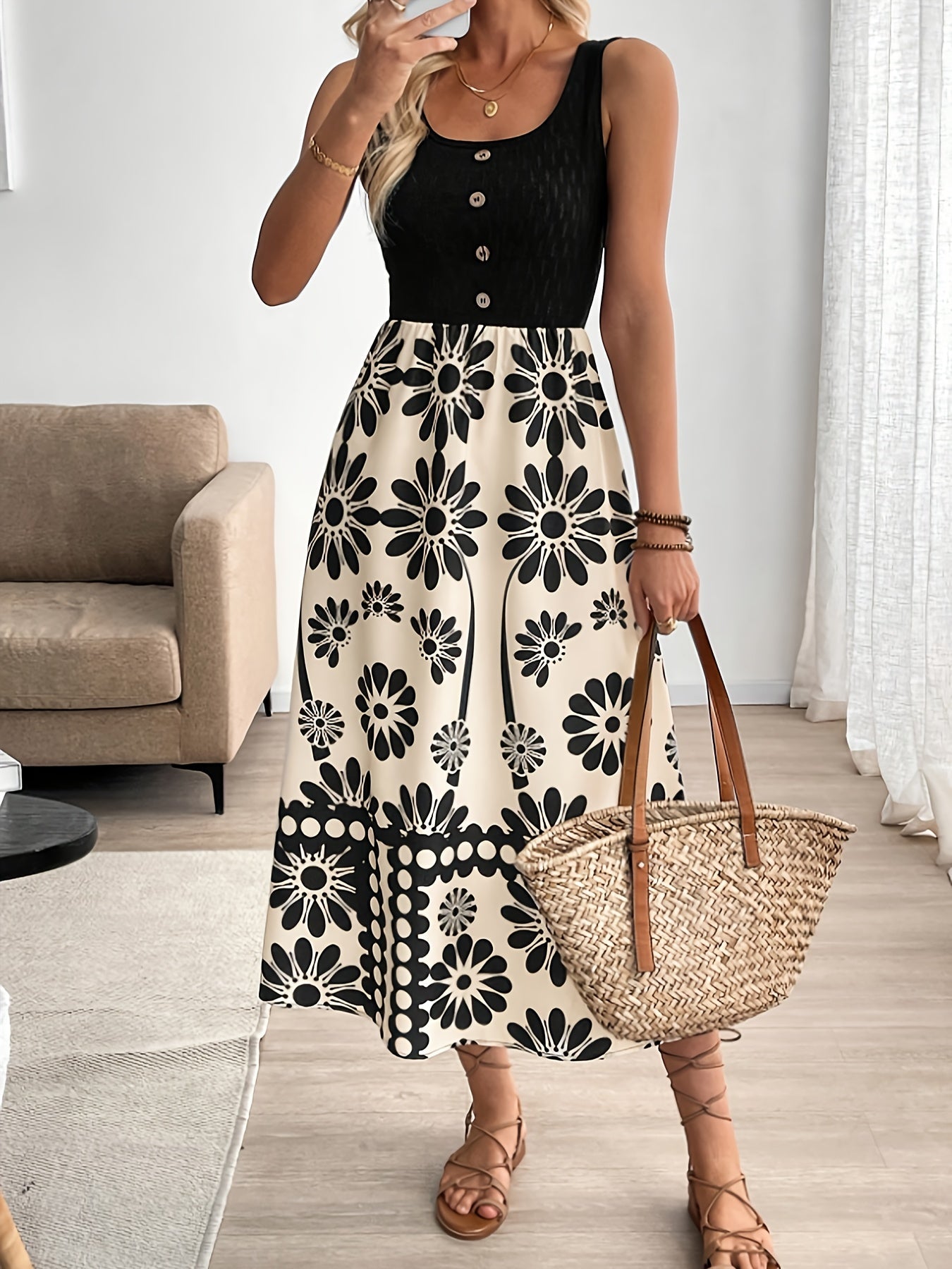 Feminines schwarzes Maxikleid mit ärmellosem floralem Muster Elegantes Kleid